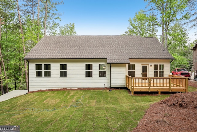 2279 Lakeview Pkwy, Villa Rica, GA 30180 - back of property with a wooden deck and a shingled roof