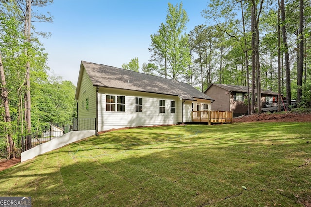 2279 Lakeview Pkwy, Villa Rica, GA 30180 - back of house with a deck and a lawn