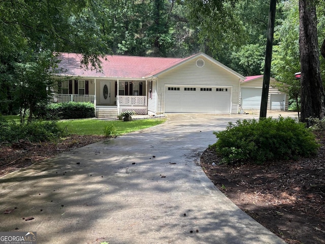 161 Cedar Cove Dr, Buckhead, GA 30625 - ranch-style house with covered porch, concrete driveway, and an attached garage