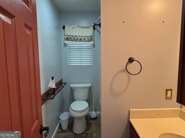 161 Cedar Cove Dr, Buckhead, GA 30625 - bathroom featuring vanity, toilet, and baseboards