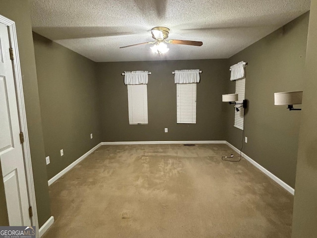 161 Cedar Cove Dr, Buckhead, GA 30625 - carpeted empty room featuring ceiling fan, a textured ceiling, and baseboards