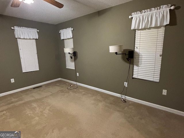 161 Cedar Cove Dr, Buckhead, GA 30625 - carpeted empty room with a ceiling fan, a textured ceiling, and baseboards