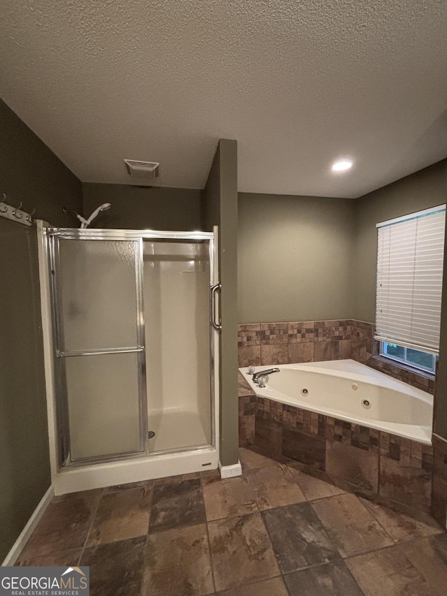 161 Cedar Cove Dr, Buckhead, GA 30625 - bathroom with a shower stall, a whirlpool tub, and a textured ceiling