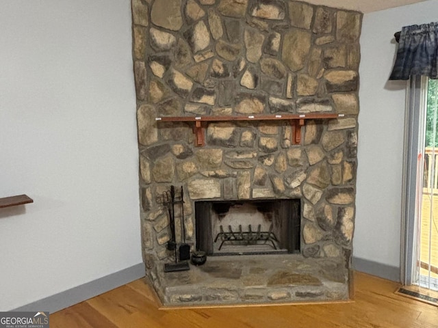 161 Cedar Cove Dr, Buckhead, GA 30625 - detailed view of a fireplace, wood finished floors, and baseboards