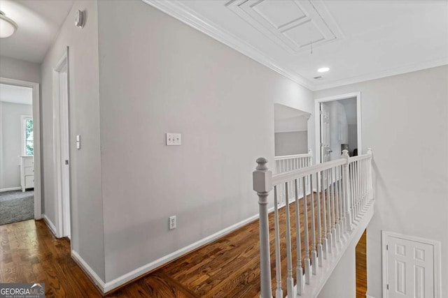 4381 Laurian Dr NW, Kennesaw, GA 30144 - corridor with an upstairs landing, attic access, crown molding, wood finished floors, and recessed lighting