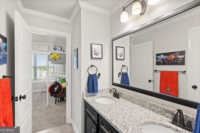 1858 Switchgrass Dr, Statham, GA 30666 - bathroom featuring double vanity, baseboards, tile patterned flooring, and ornamental molding