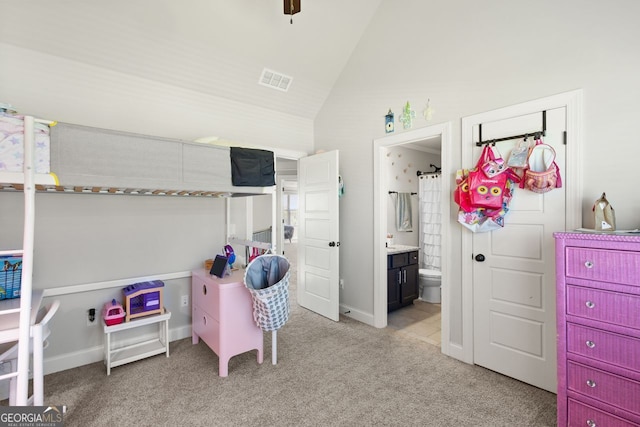 1858 Switchgrass Dr, Statham, GA 30666 - bedroom featuring lofted ceiling, light carpet, and connected bathroom