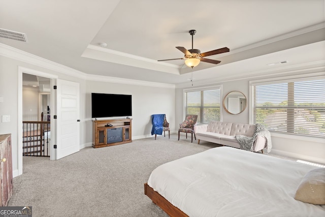 1858 Switchgrass Dr, Statham, GA 30666 - bedroom featuring crown molding, a tray ceiling, carpet, baseboards, and ceiling fan