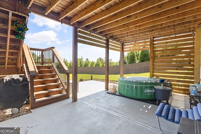 1858 Switchgrass Dr, Statham, GA 30666 - fenced backyard featuring stairs and a patio