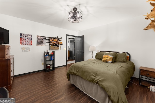 231 Doug Allison Hts, Cleveland, GA 30528 - bedroom with wood finished floors, baseboards, and a chandelier