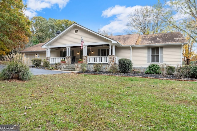 231 Doug Allison Hts, Cleveland, GA 30528 - view of front of property with covered porch, a front yard, driveway, a garage, and roof with shingles