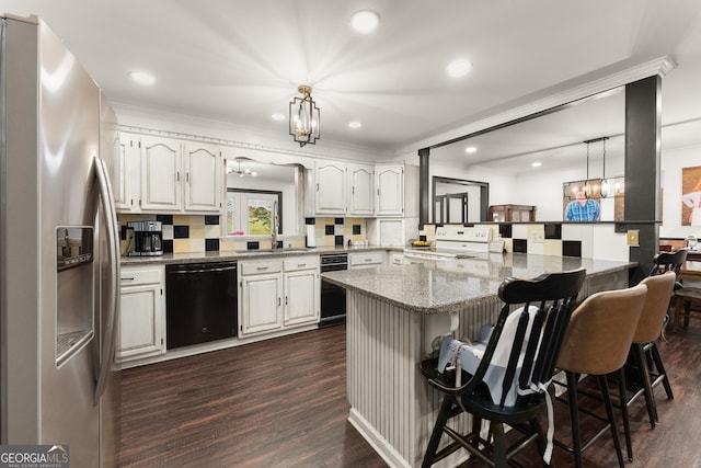 231 Doug Allison Hts, Cleveland, GA 30528 - kitchen with dishwasher, stainless steel fridge, electric range, a chandelier, and a breakfast bar