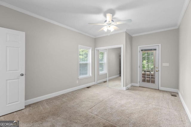 85 Arabian Ave, Alpharetta, GA 30004 - carpeted empty room featuring ceiling fan, crown molding, and baseboards