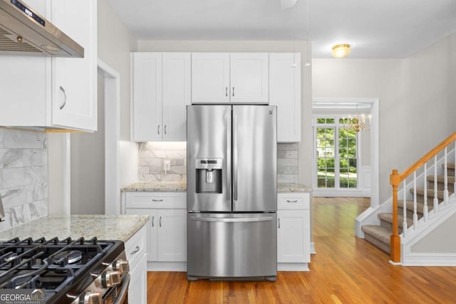 85 Arabian Ave, Alpharetta, GA 30004 - kitchen with appliances with stainless steel finishes, under cabinet range hood, and white cabinetry