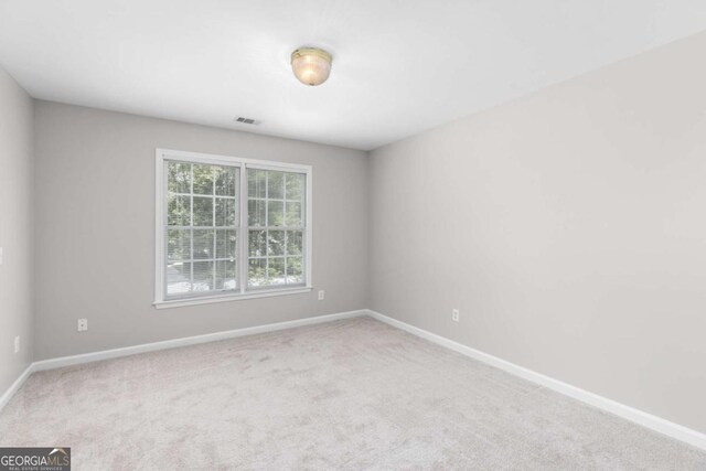 85 Arabian Ave, Alpharetta, GA 30004 - empty room featuring baseboards and carpet flooring