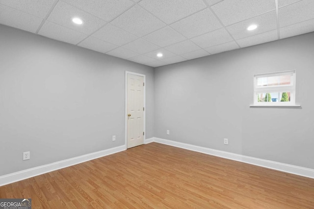85 Arabian Ave, Alpharetta, GA 30004 - empty room with light wood-type flooring, recessed lighting, baseboards, and a paneled ceiling