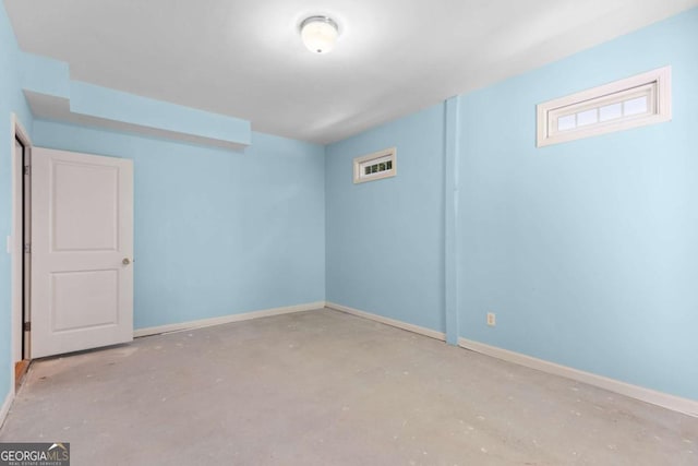 85 Arabian Ave, Alpharetta, GA 30004 - spare room featuring baseboards and concrete flooring