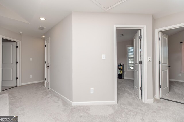 646 Mccarley Downs Dr, Bonaire, GA 31005 - hallway with carpet flooring, baseboards, and attic access