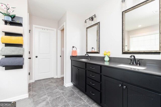 646 Mccarley Downs Dr, Bonaire, GA 31005 - full bath with double vanity and baseboards