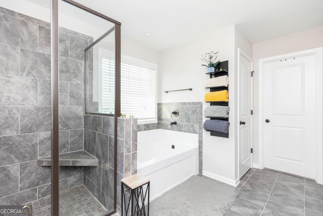 646 Mccarley Downs Dr, Bonaire, GA 31005 - bathroom with a bath, a shower stall, and tile patterned flooring