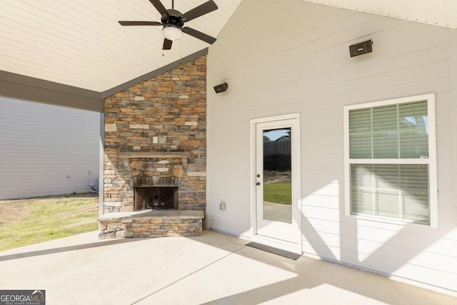 646 Mccarley Downs Dr, Bonaire, GA 31005 - view of patio / terrace with an outdoor stone fireplace and a ceiling fan
