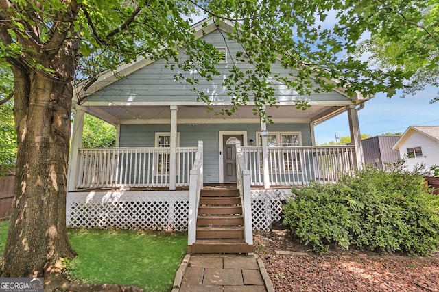 827 Fraser St SE, Atlanta, GA 30315 - shotgun-style home with covered porch