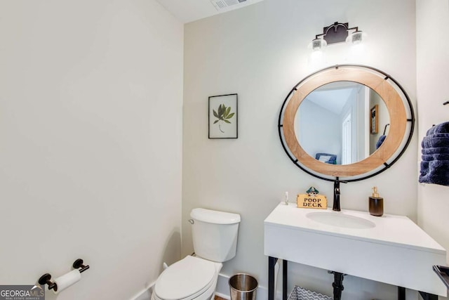 1685 Valley Rd NE, Gainesville, GA 30501 - half bath featuring toilet and a sink