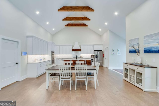1685 Valley Rd NE, Gainesville, GA 30501 - dining space with high vaulted ceiling, light wood finished floors, beam ceiling, and recessed lighting