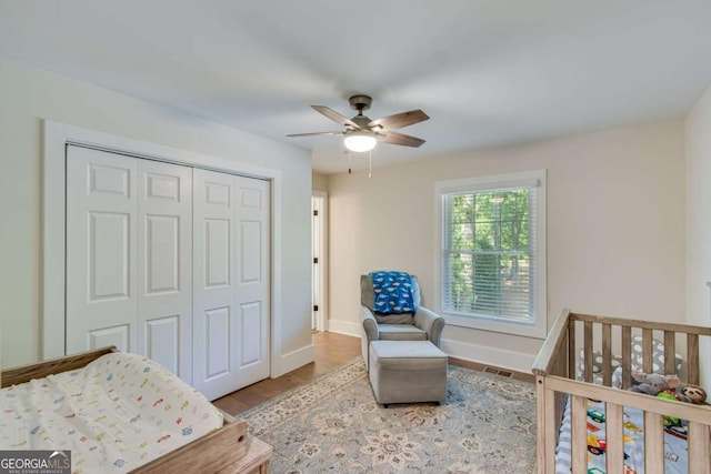 1685 Valley Rd NE, Gainesville, GA 30501 - bedroom with a closet, ceiling fan, and wood finished floors