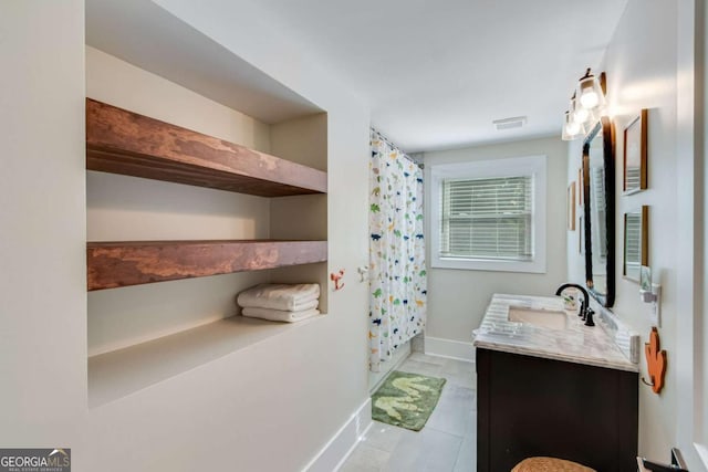 1685 Valley Rd NE, Gainesville, GA 30501 - bathroom with vanity and tile patterned floors
