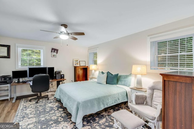 1685 Valley Rd NE, Gainesville, GA 30501 - bedroom featuring a desk, wood finished floors, and a ceiling fan