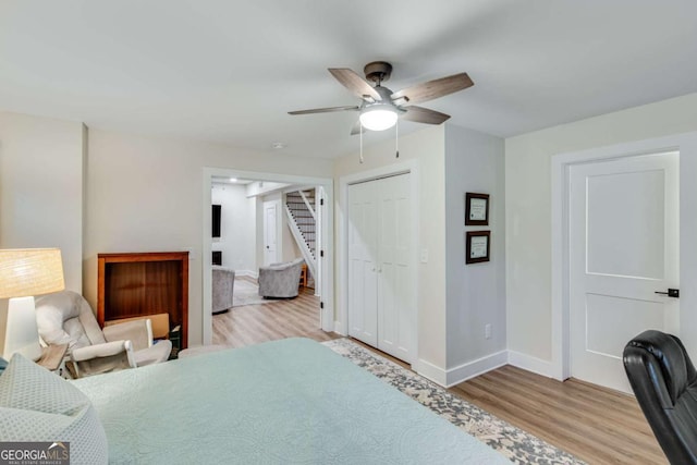 1685 Valley Rd NE, Gainesville, GA 30501 - bedroom featuring wood finished floors, a closet, and a ceiling fan