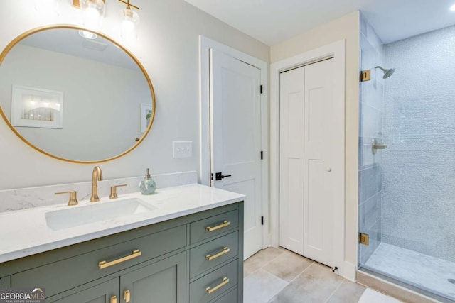 1685 Valley Rd NE, Gainesville, GA 30501 - full bath with vanity, a shower stall, a closet, and tile patterned floors