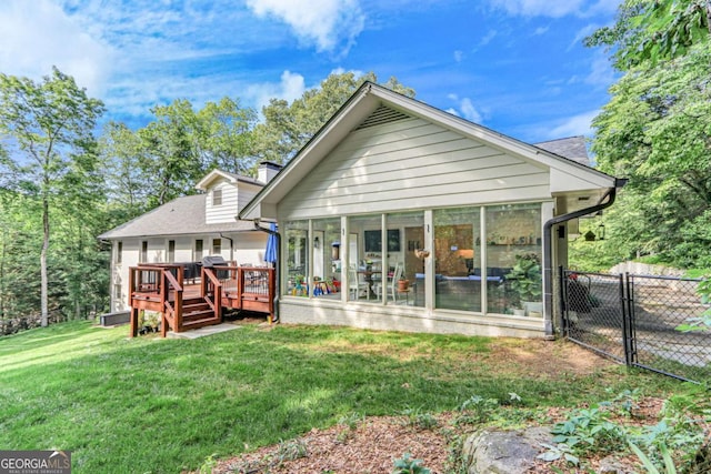 1685 Valley Rd NE, Gainesville, GA 30501 - rear view of property featuring a sunroom, a chimney, and a deck