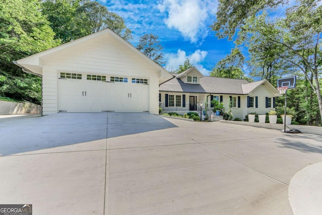1685 Valley Rd NE, Gainesville, GA 30501 - view of front of property featuring concrete driveway and a porch
