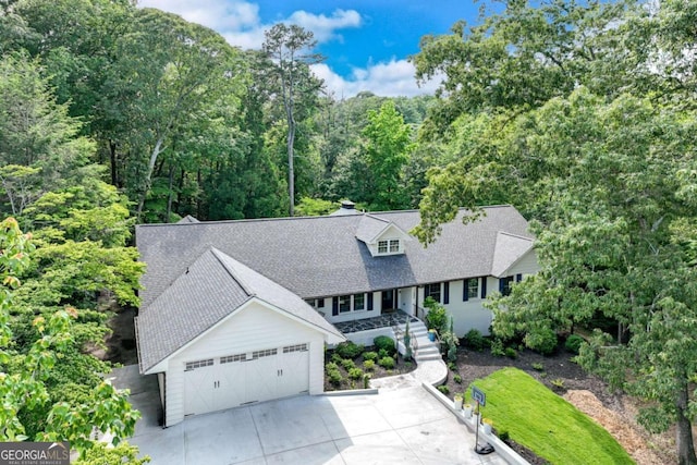 1685 Valley Rd NE, Gainesville, GA 30501 - cape cod home featuring a shingled roof and a view of trees