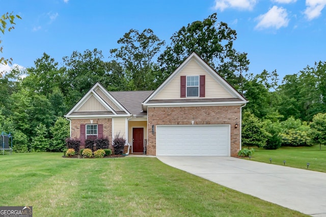 1431 Beckett Dr, Hampton, GA 30228 - view of front facade with a trampoline, a front yard, driveway, and a garage