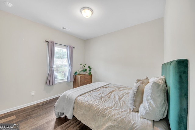 1431 Beckett Dr, Hampton, GA 30228 - bedroom with wood finished floors and baseboards