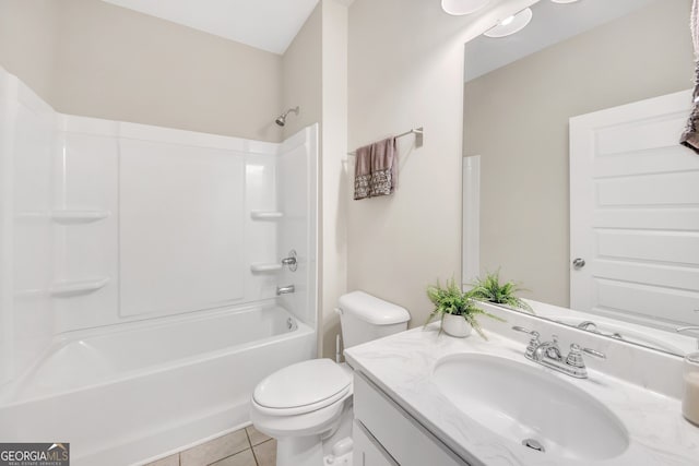 1431 Beckett Dr, Hampton, GA 30228 - full bath with vanity, tile patterned floors, toilet, and  shower combination