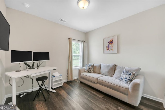 1431 Beckett Dr, Hampton, GA 30228 - home office featuring dark wood-type flooring and baseboards