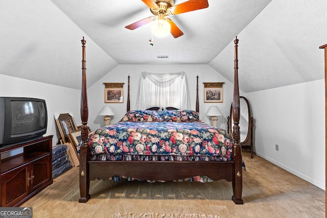 75 Antioch Rd, Mcdonough, GA 30252 - bedroom featuring light colored carpet, vaulted ceiling, a textured ceiling, a ceiling fan, and baseboards