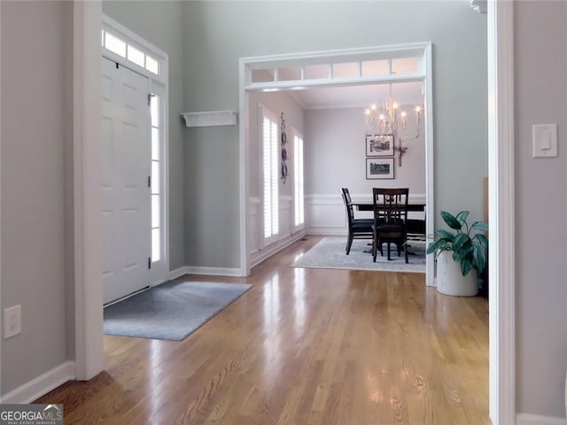 21 Devin Ln, Euharlee, GA 30145 - entryway with a chandelier, healthy amount of natural light, and wood finished floors