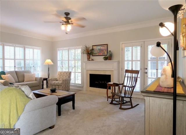 21 Devin Ln, Euharlee, GA 30145 - living area featuring light carpet, a ceiling fan, crown molding, a fireplace with flush hearth, and french doors