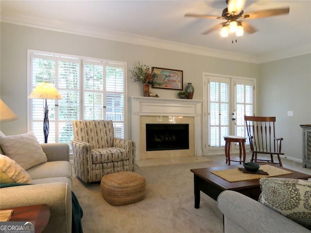 21 Devin Ln, Euharlee, GA 30145 - carpeted living room with ornamental molding, ceiling fan, plenty of natural light, and a high end fireplace