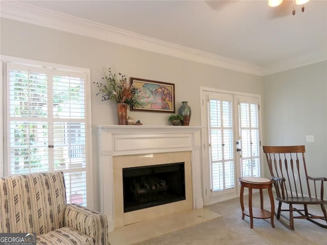 21 Devin Ln, Euharlee, GA 30145 - sitting room featuring carpet, a fireplace with raised hearth, crown molding, plenty of natural light, and ceiling fan