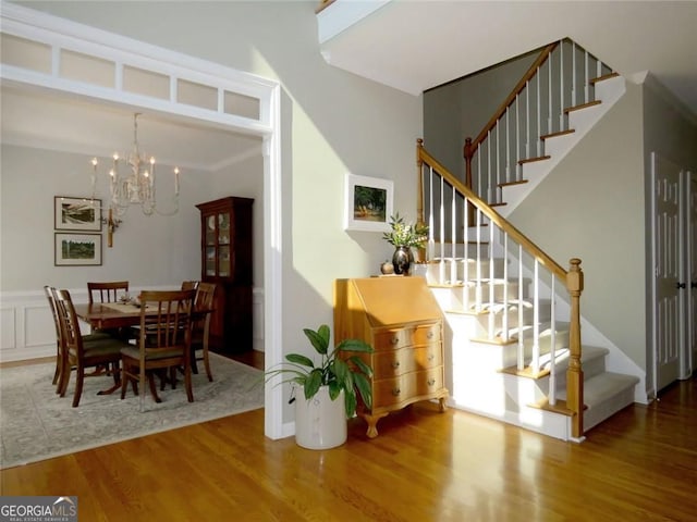21 Devin Ln, Euharlee, GA 30145 - dining room with a chandelier, wood finished floors, and stairway