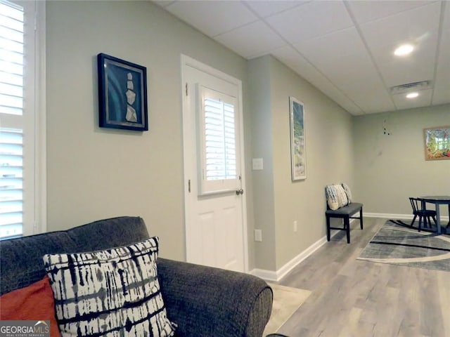 21 Devin Ln, Euharlee, GA 30145 - living area featuring wood finished floors, plenty of natural light, a drop ceiling, and recessed lighting
