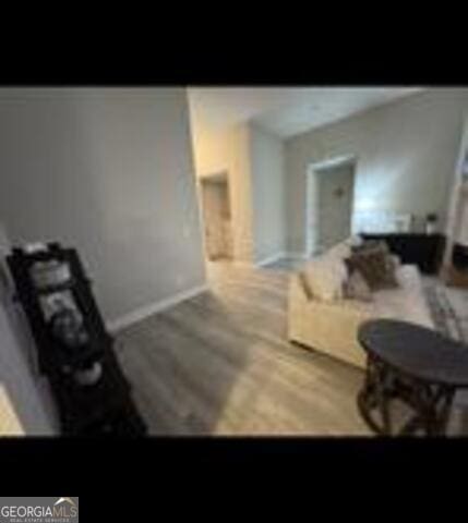 406 Clifton Rd, Perry, GA 31069 - living room with wood finished floors and baseboards