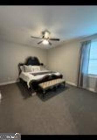 406 Clifton Rd, Perry, GA 31069 - bedroom with baseboards and ceiling fan