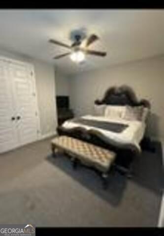 406 Clifton Rd, Perry, GA 31069 - bedroom featuring carpet and ceiling fan